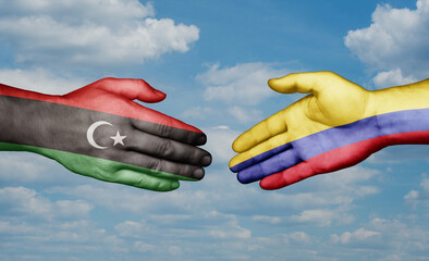 Colombia and Libya country handshaking with flags, consensus concept international co-operation illustration