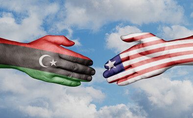 Liberia and Libya country handshaking with flags, consensus concept international co-operation illustration