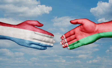 Belarus and Luxembourg country handshaking with flags, consensus concept international co-operation illustration