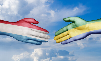 Gabon and Luxembourg country handshaking with flags, consensus concept international co-operation illustration