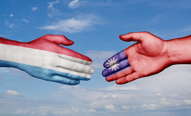 Taiwan and Luxembourg country handshaking with flags, consensus concept international co-operation illustration