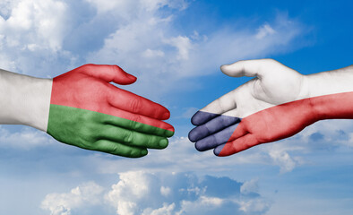 Czech Republic and Madagascar country handshaking with flags, consensus concept international co-operation illustration