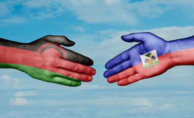 Haiti and Malawi country handshaking with flags, consensus concept international co-operation illustration