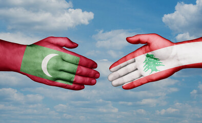 Lebanon and Maldives country handshaking with flags, consensus concept international co-operation illustration