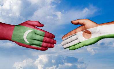 Niger and Maldives country handshaking with flags, consensus concept international co-operation illustration