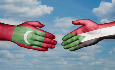 Sudan and Maldives country handshaking with flags, consensus concept international co-operation illustration