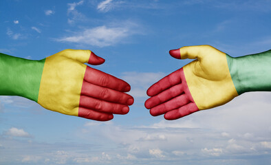 Republic of Guinea and Mali country handshaking with flags, consensus concept international co-operation illustration