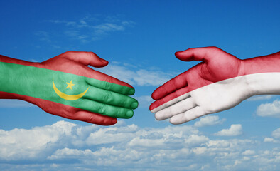 Indonesia and Mauritania country handshaking with flags, consensus concept international co-operation illustration