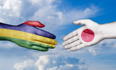 Japan and Mauritius country handshaking with flags, consensus concept international co-operation illustration