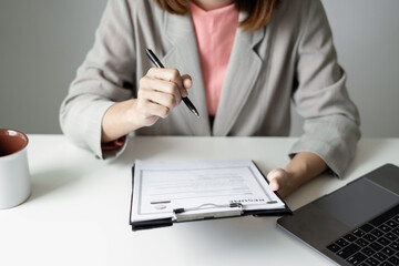 Business woman employer holding resume hiring recruit looking cv resume to hire candidates,...