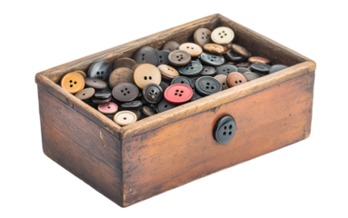 a wooden box full of buttons

