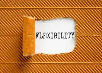 Flexibility symbol. Concept word Flexibility on beautiful white paper. Beautiful brown paper...
