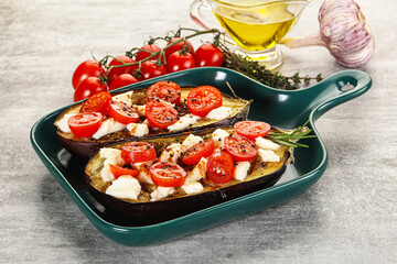 Baked eggplant with cheese and tomato