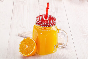 Sweet fresh orange juice in the glass