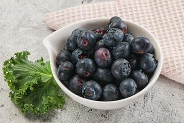 Sweet ripe blueberry on the bowl