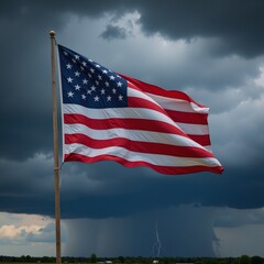 Obraz premium American flag amidst approaching clouds during an impending thunderstorm