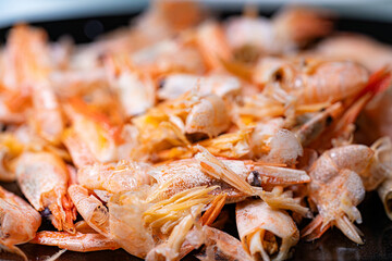 Freshly cooked shrimp prepared for a seafood feast.