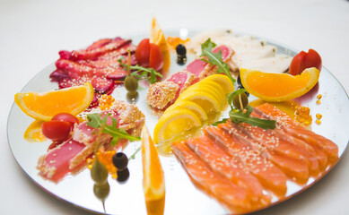 Vibrant seafood and fruit platter.