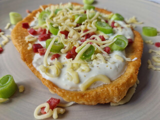 Hungarian Langos with Garlic Cream, Bacon, Spring Onions, and Cheese