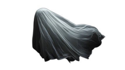 A ghostly white sheet floating in the air with no visible body placed against a solid black background
