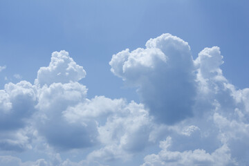 
Blue sky with puffy clouds