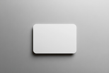 3D render of a white, blank rectangular card on a grey background. Created with Ai
