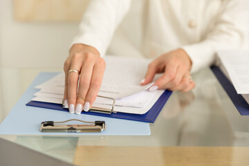 close-up of the paperwork in the office. Documentation and negotiations with clients