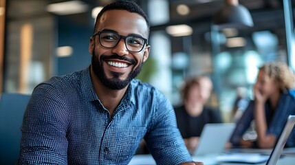 Fototapeta premium Smiling Man Wearing Glasses in Office Setting