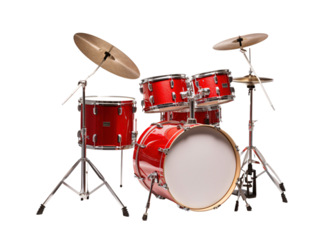 a red drum set with cymbals