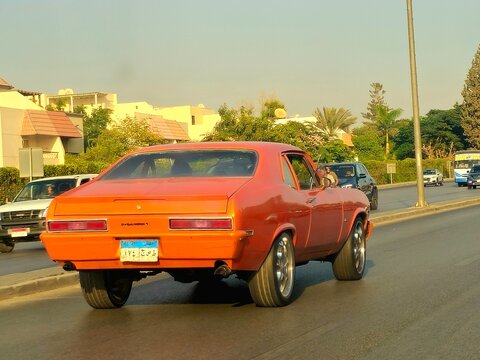 Cairo, Egypt, September 25 2024:an old vintage classic retro car of old times on its road in New Cairo city in Egypt, classic old timer iconic vehicle car, selective focus