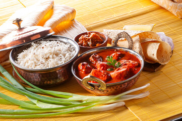 Chicken Tikka with jeera rice with papadum and mango pickle and sliced onion   