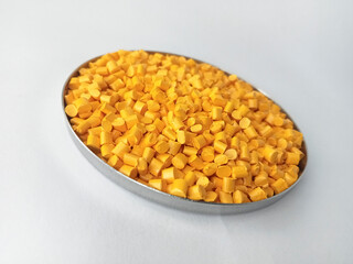 Red masterbatch granule, red polypropylene polymer granules, cold cutting type granule texture, isolated on white background, for industrial plastic company profile product catalog design