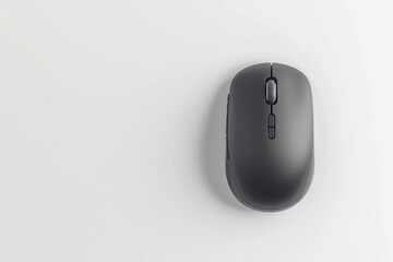A wireless mouse seen from above on a white surface