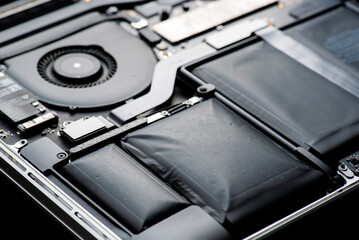 close up of Technician repairing electronic circuit board, repairing deteriorated battery, upgrade...