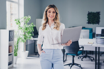 Photo of pretty young girl hold netbook manager wear formalwear coworking successful nice light office