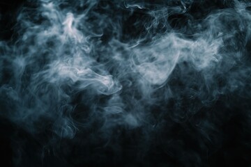 Obraz premium A black and white photo of smoke with a dark background