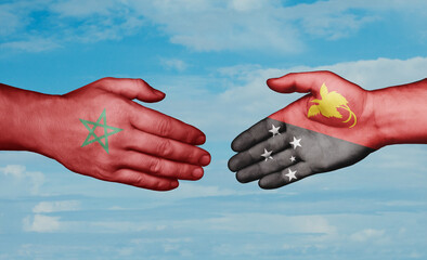 Papua New Guinea and Morocco country handshaking with flags, consensus concept international co-operation illustration