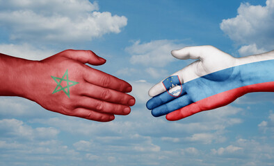 Slovenia and Morocco country handshaking with flags, consensus concept international co-operation illustration