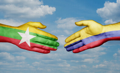 Colombia and Myanmar country handshaking with flags, consensus concept international co-operation illustration