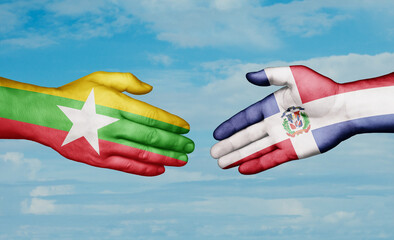 Dominican Republic and Myanmar country handshaking with flags, consensus concept international co-operation illustration
