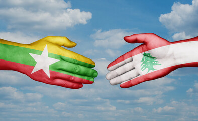 Lebanon and Myanmar country handshaking with flags, consensus concept international co-operation illustration