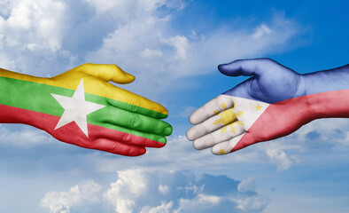 Philippines and Myanmar country handshaking with flags, consensus concept international co-operation illustration