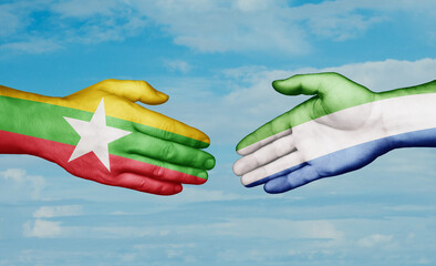 Sierra Leone or Salone and Myanmar country handshaking with flags, consensus concept international co-operation illustration