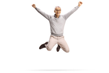 Happy and excited elderly man jumping