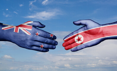 North Korea and New Zealand country handshaking with flags, consensus concept international co-operation illustration