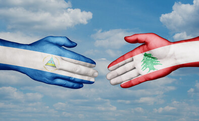 Lebanon and Nicaragua country handshaking with flags, consensus concept international co-operation illustration