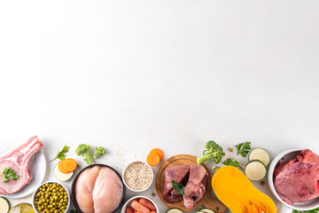 BARF food ingredients, healthy balanced diet for animal background. Biologically Appropriate Raw Food assortment for making barf trendy pet bowl