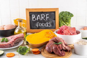 BARF food ingredients, healthy balanced diet for animal background. Biologically Appropriate Raw...
