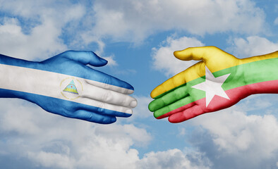 Myanmar aka Burma and Nicaragua country handshaking with flags, consensus concept international co-operation illustration