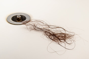 Clump of hair in bathtub drain